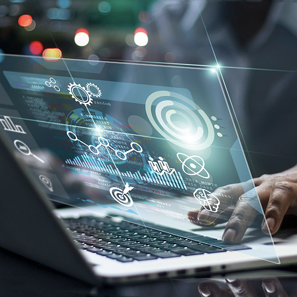 Man with laptop monitoring applications using full-stack observability from AppDynamics in Microsoft Azure Spring Cloud